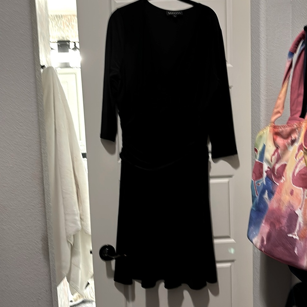 Black, long sleeve. Criss cross top.